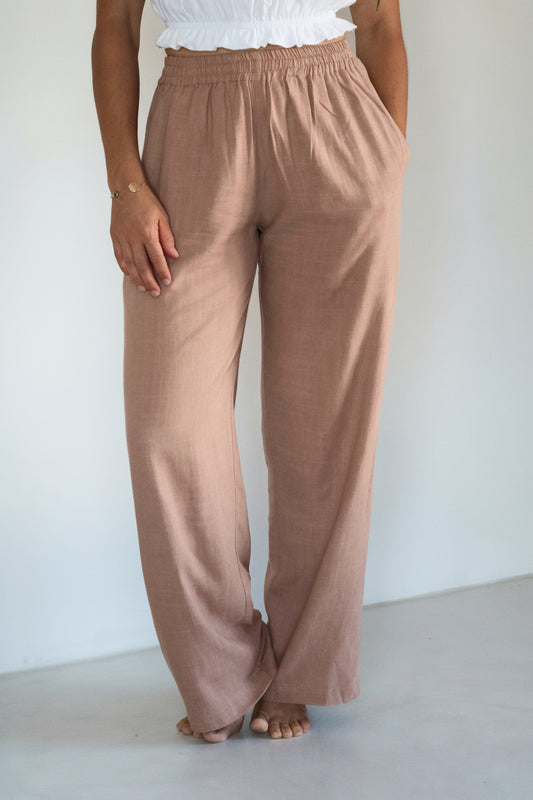 Pantalon femme en lin rose poudré